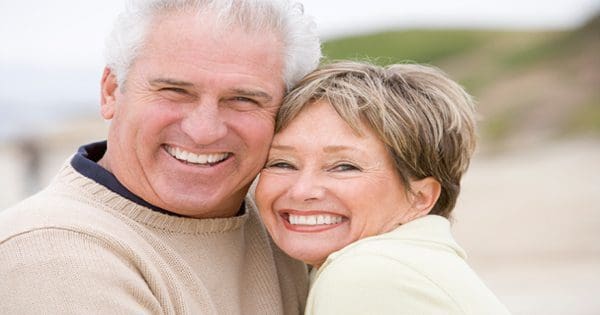 blog picture of elderly couple hugging and smiling