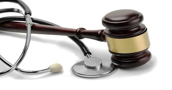 blog picture of stethoscope and gavel intertwined
