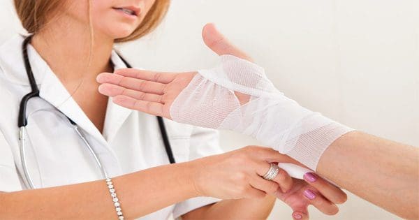 blog picture of nurse wrapping a patients wrist